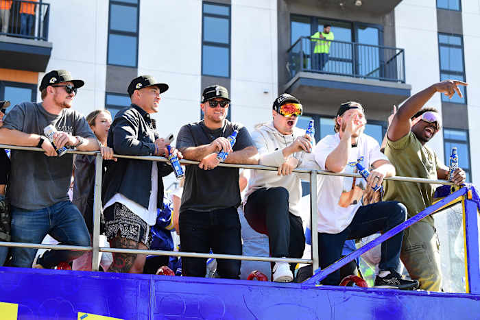 Feb 16, 2022; Los Angeles, CA, USA; Los Angeles Rams players celebrateduring the championship victory parade. Mandatory Credit: Gary A. Vasquez-USA TODAY Sports